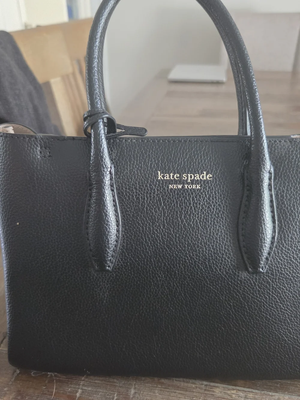 kate spade black pebbled leather satchel with gold logo